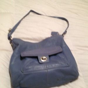 Leather coach bag blue has a few marks inside