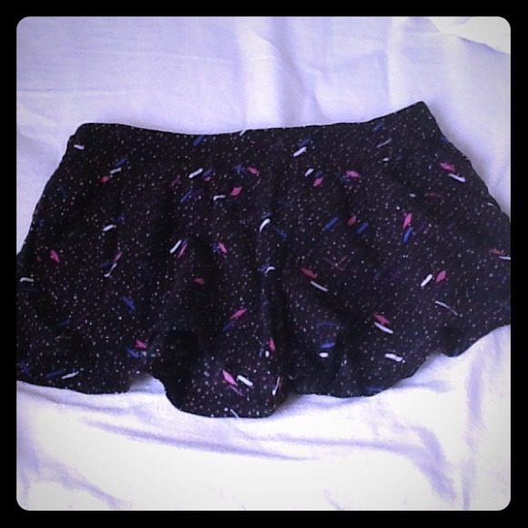white, blue, purple, pink polka dots black shorts