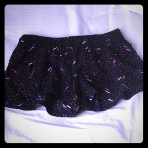 white, blue, purple, pink polka dots black shorts