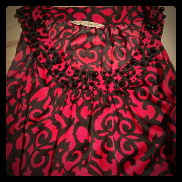 Red and black beaded shirt