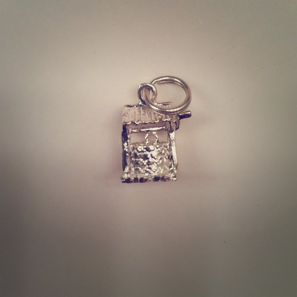 SOLD Silver well charm