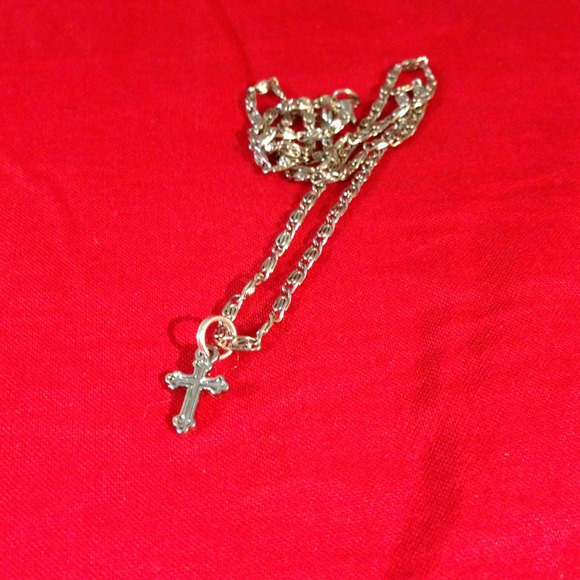 **Sold** The cross necklace