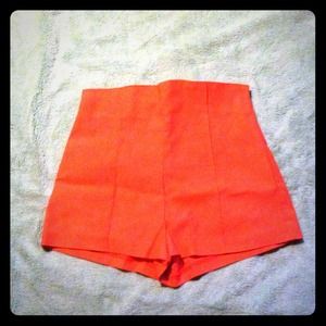 Coral high waist stretch shorts with zip closure