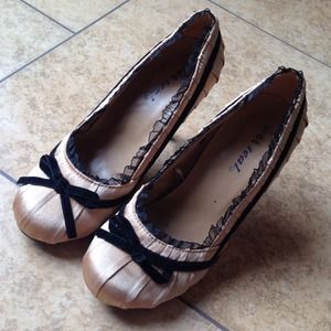 Gold and black heels