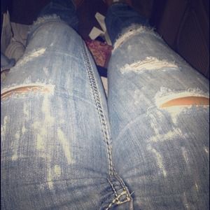 Distressed jeans.