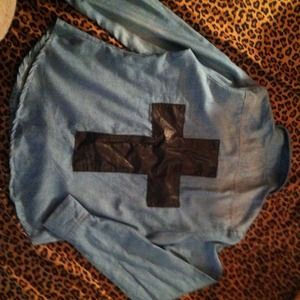 Blue jean shirt with cross on the back