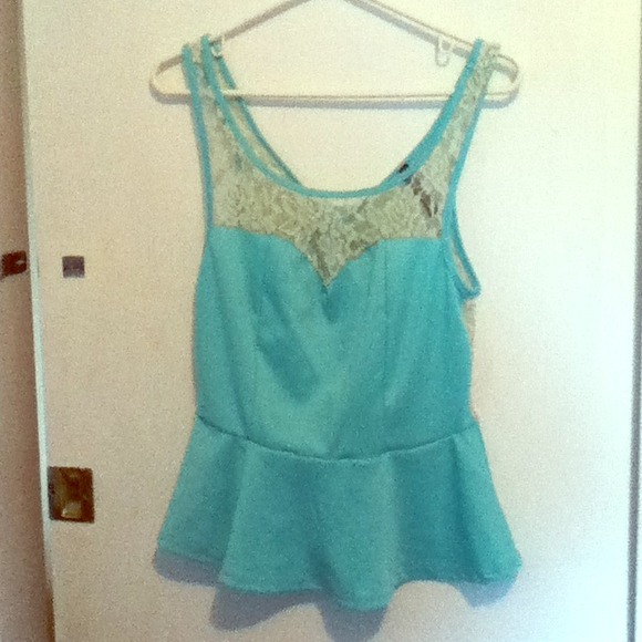 Light aqua colored pendulum tank top