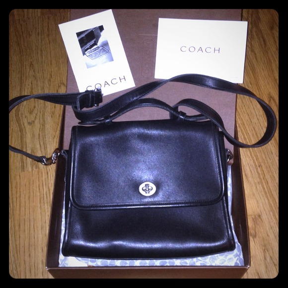 Black leather Coach handbag **on hold for bly766**