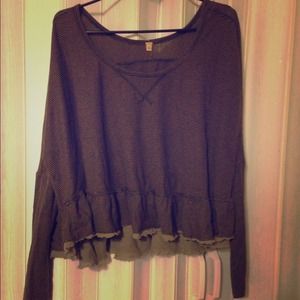 Mid drift ruffled bottom top