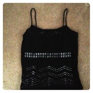 A black spaghetti strap top