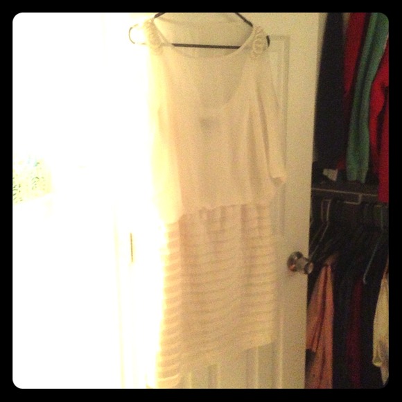 White dress. Beading on top of shoulders shear top