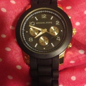 Inspired: Mk black and gold watch