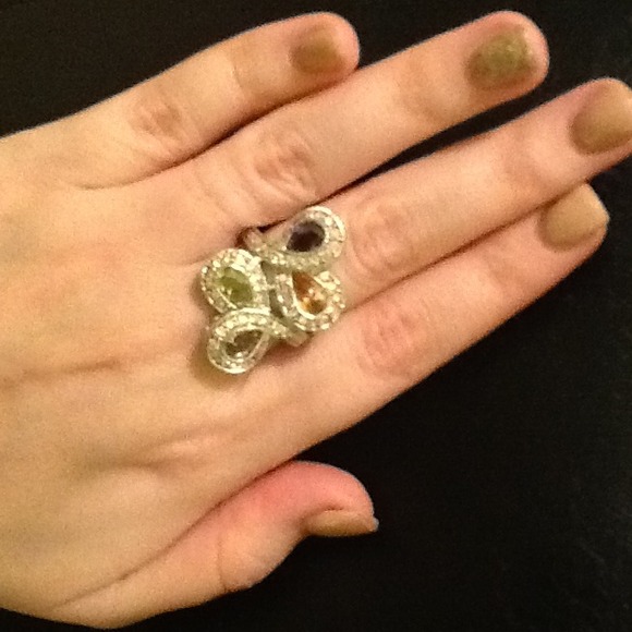 Multi colored stone ring.  Silver setting
