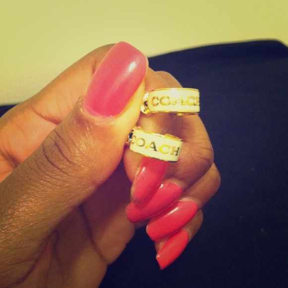 Gold & White Coach earrings