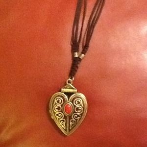 Lucky inspired brushed gold heart locket.