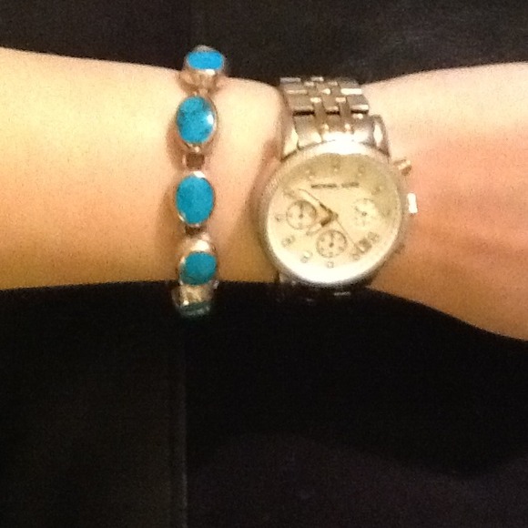 Turquoise and Mexican silver.