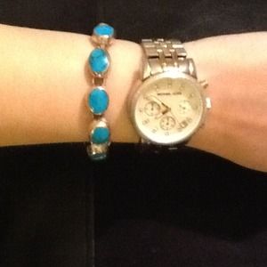 Turquoise and Mexican silver.