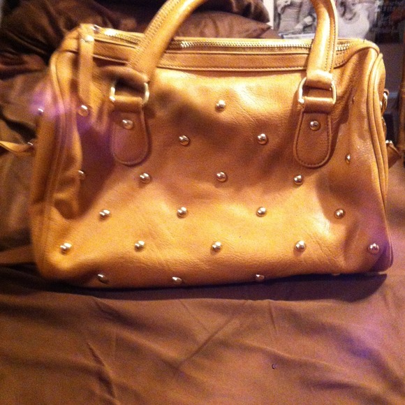 Tan purse with gold studs