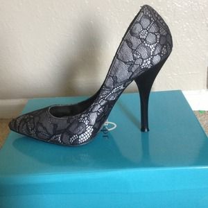 Black Lace pointed toe heels.