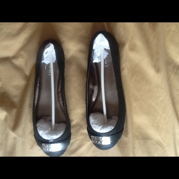 Brand New Coach flats. *Reserved*