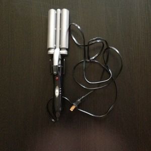 Never used. Waving iron from Revlon.