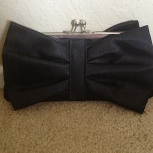 Black clutch. Only used once, optional strap.