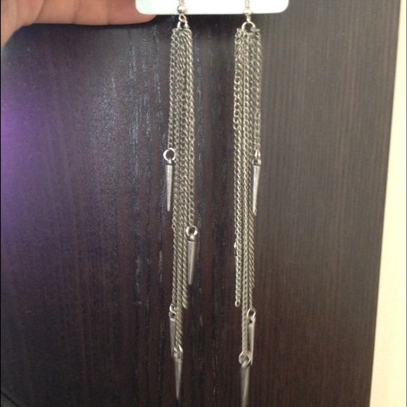 Brand new  long gun metal earrings with spikes