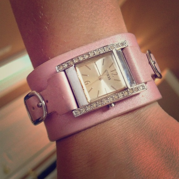 Guess watch. Pink strapped, diamond studded.