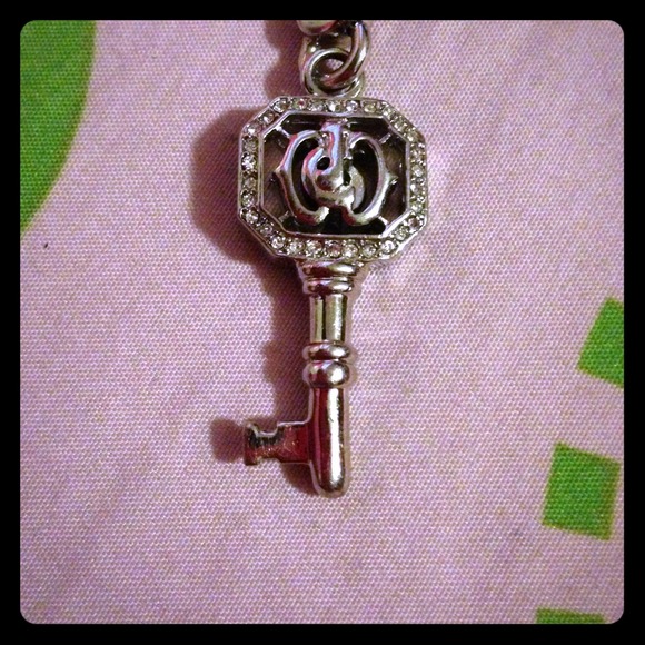Juicy Couture Jewelry - Juicy charm . Never used . Key