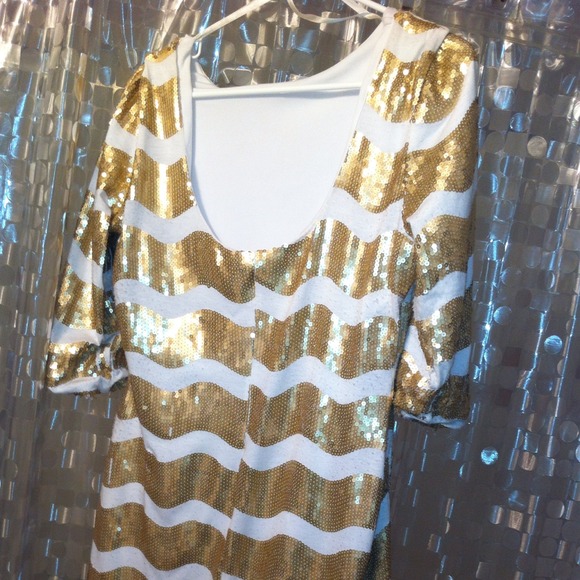 Charlotte rouse white and gold dress