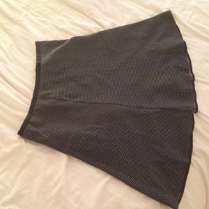 Black skirt w/white dots by Warehouse size 6