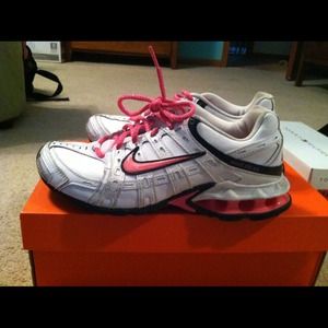 White and pink Nike reax
