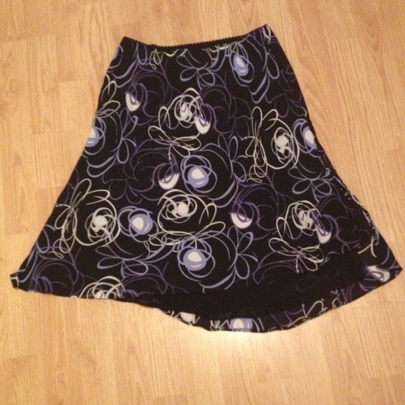 100% pure silk lined skirt. Petite