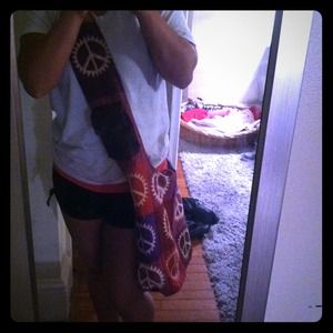Cross body with cell phone holder on strap