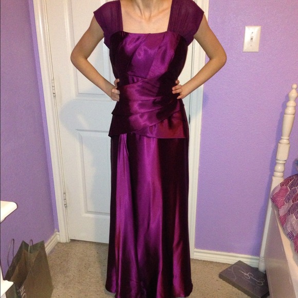 Satin, plum colored gown.