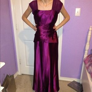 Satin, plum colored gown.