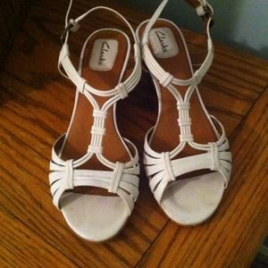 White wedge sandals.
