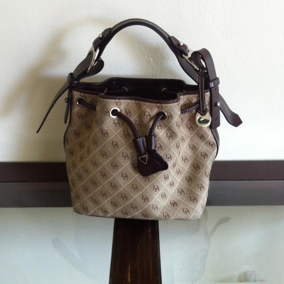Dooney&Burke drawstring handbag. Worn  but nice.