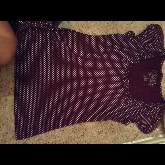 Purple polka dotted shirt