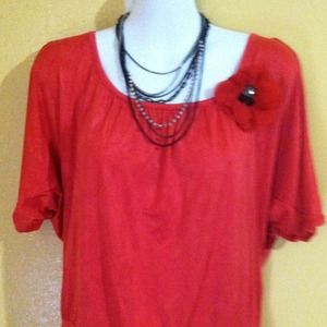 SOLD...Red blouse with flower accent