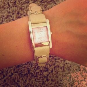 Cream Watch with buckles and a pink face