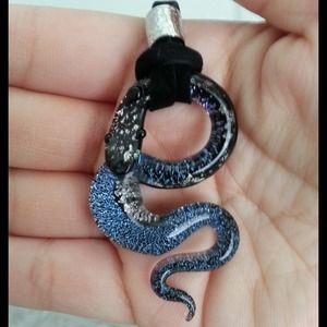I'm selling a Murano glass snake necklace