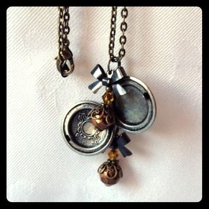 Metal Locket with Bows and Charms