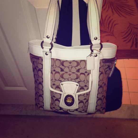 Coach bag small pink spot in bottom $75