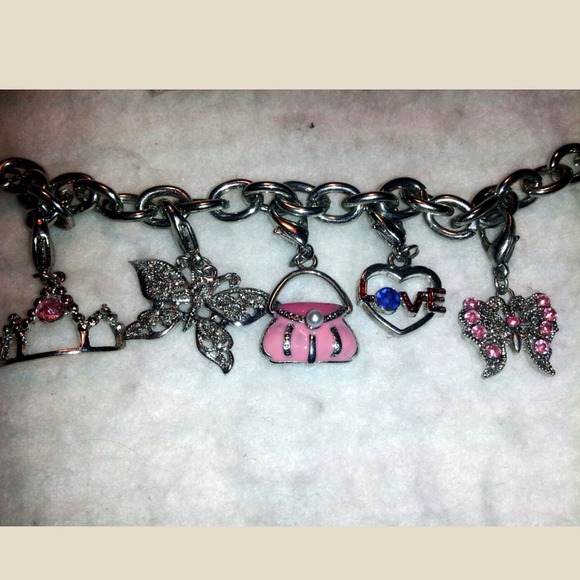 SOLD $was 20$ girlie bracelet w/ 12 charms - Picture 2 of 4