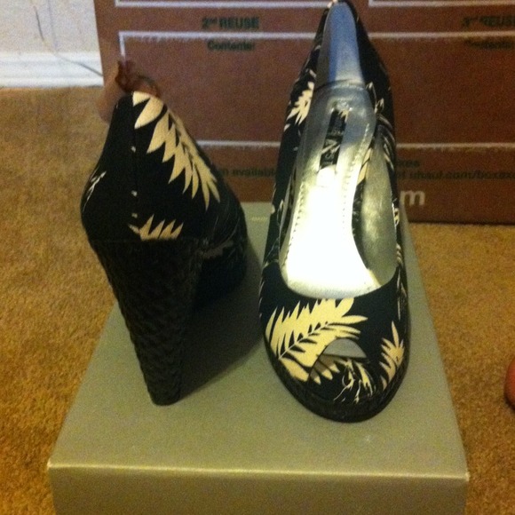 Black and white, wedge designer brand new.