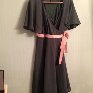 Emerald green wrap dress with pink sash