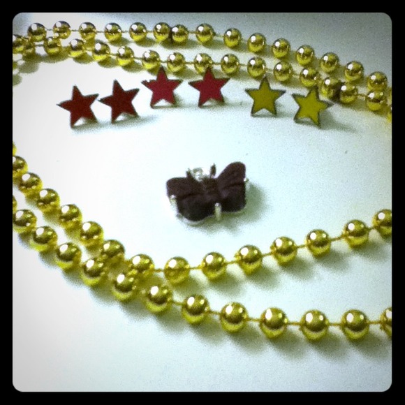 Butterfly charm and 3 pairs of star studs