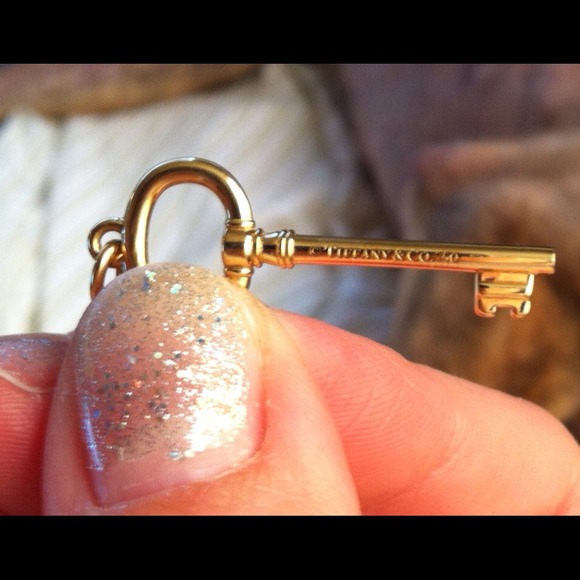 Reserved.  18k gold authentic Tiffany pendant.