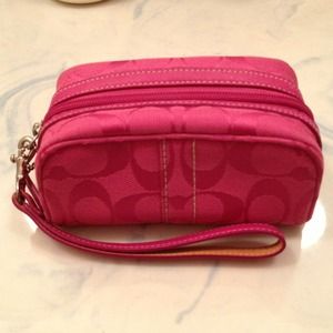 Coach cosmetic pouch in magenta